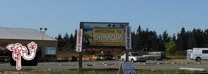 Chimacum, WA, a picture of the welcome to Chimacum sign in front of a business building and the Swift Plumbing logo