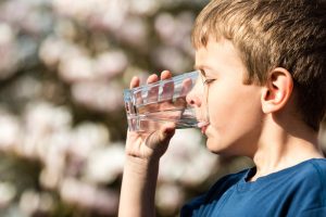 boy-drinking-pure-water